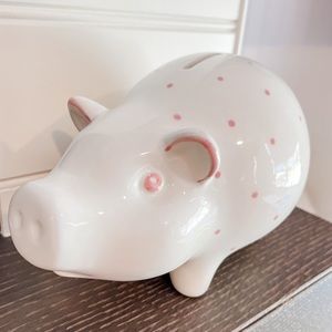 Tiffany and Co.  White pink polka dot ceramic Piggy bank.  Used but Like new.